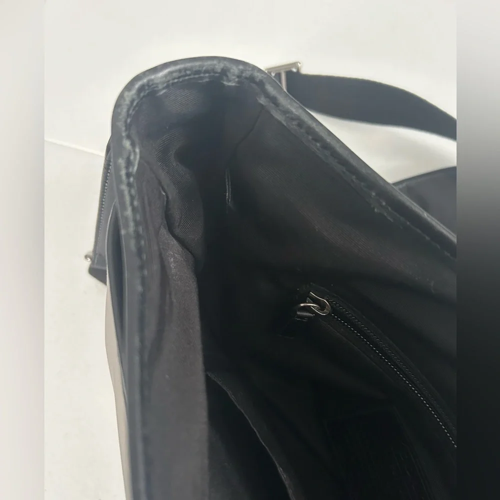 Unisex Coach crossbody messenger bag.